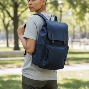 everlane the modern zip backpack mini ReNew Transit In Warm Charcoal, Polyester featuring leather trim details that give it a heritage vibe. Everlane Canvas Backpack In Dark